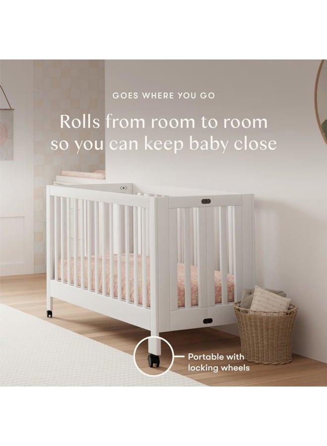 Babyletto Maki Full-Size Portable Folding Crib with Toddler Bed Conversion Kit in White, Greenguard Gold Certified - Image 2