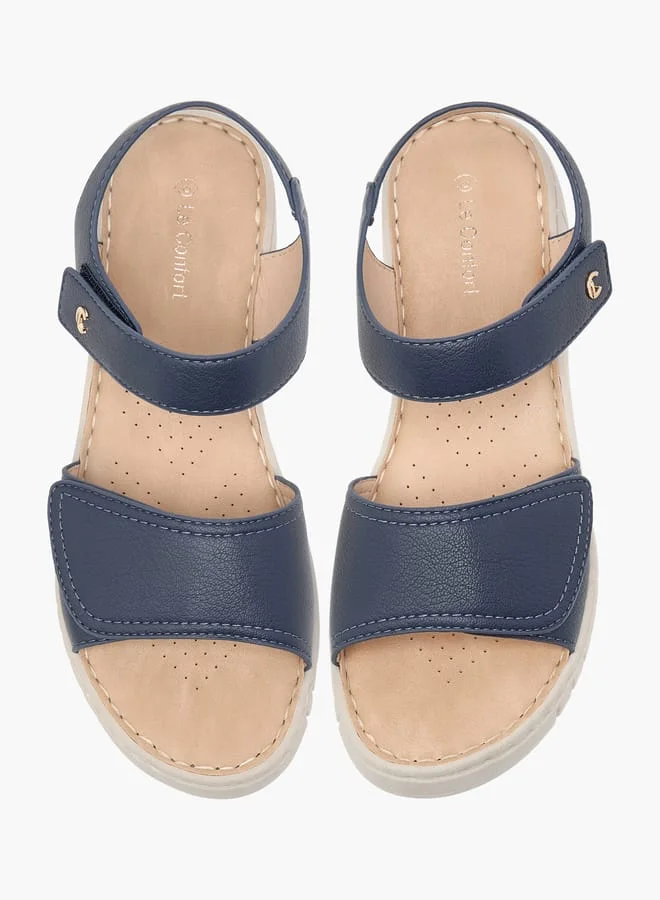 لو كونفورت صنادل نسائية بتفاصيل خياطة وإغلاق بشريط لاصق