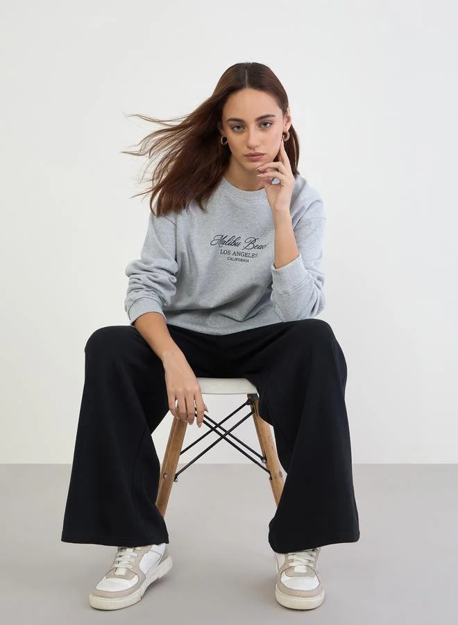 Styli Styli Printed Longline Sweatshirt and Wide Leg Joggers Co-Ords