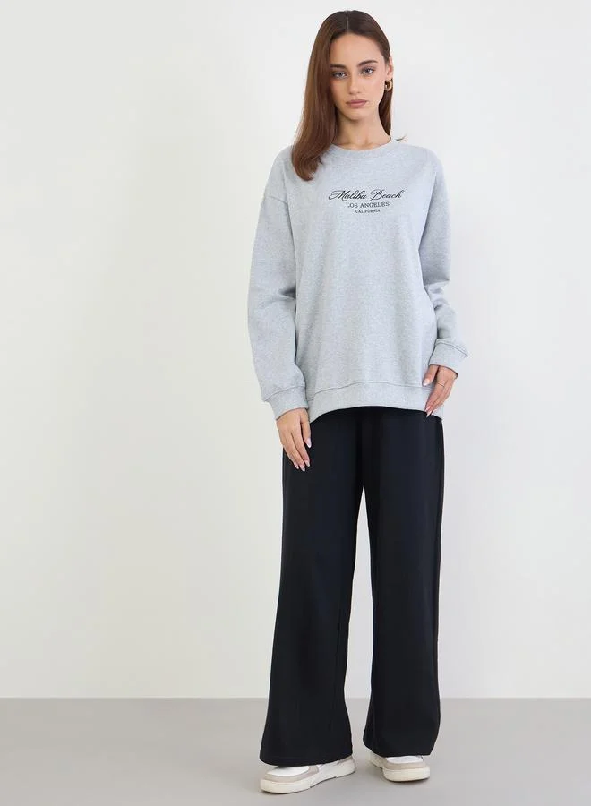 Styli Styli Printed Longline Sweatshirt and Wide Leg Joggers Co-Ords