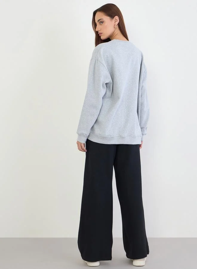 Styli Styli Printed Longline Sweatshirt and Wide Leg Joggers Co-Ords