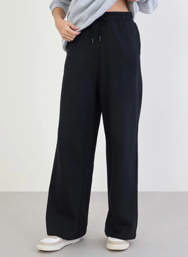 Styli Styli Printed Longline Sweatshirt and Wide Leg Joggers Co-Ords