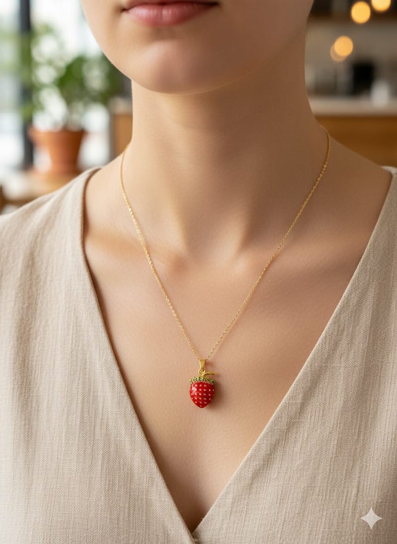 A delicate necklace with a gold-plated chain, featuring a red strawberry pendant, topped with green leaves - adjustable to fit your preferred length. - Image 3