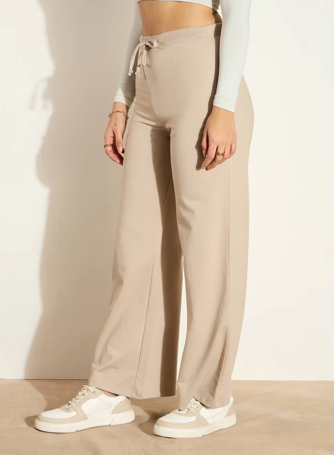SASSAFRAS Mid Rise Wide Leg Terry Track Pants