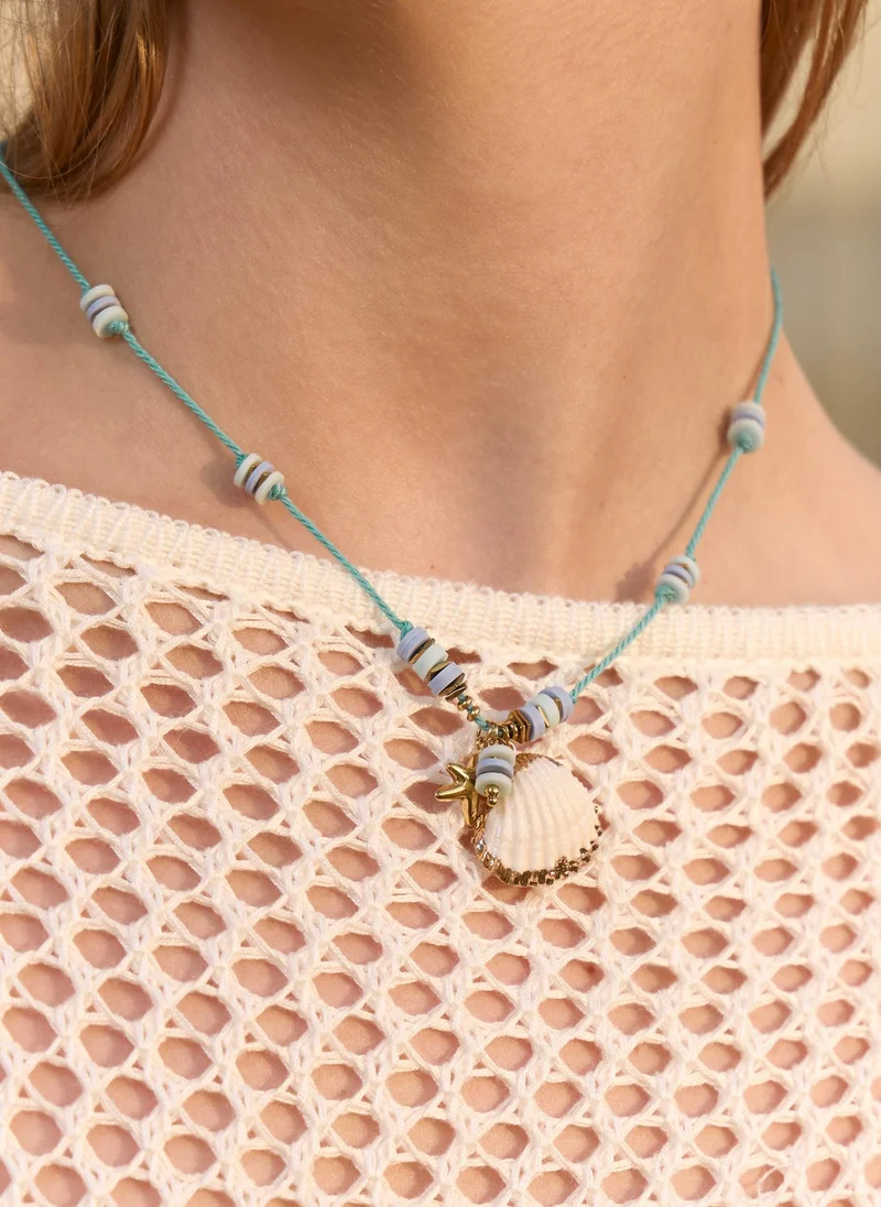 Bright necklace with shell pendant