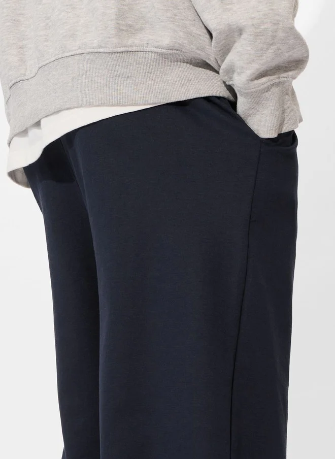 The Souled Store  The Souled Store Men Korean Solid Navy Blue Joggers  | Best Price UAE