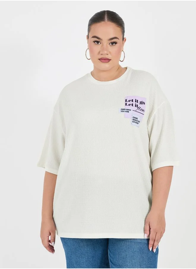 Styli Plus Size Textured Oversized T-Shirtâ€‹ with Patch Detail