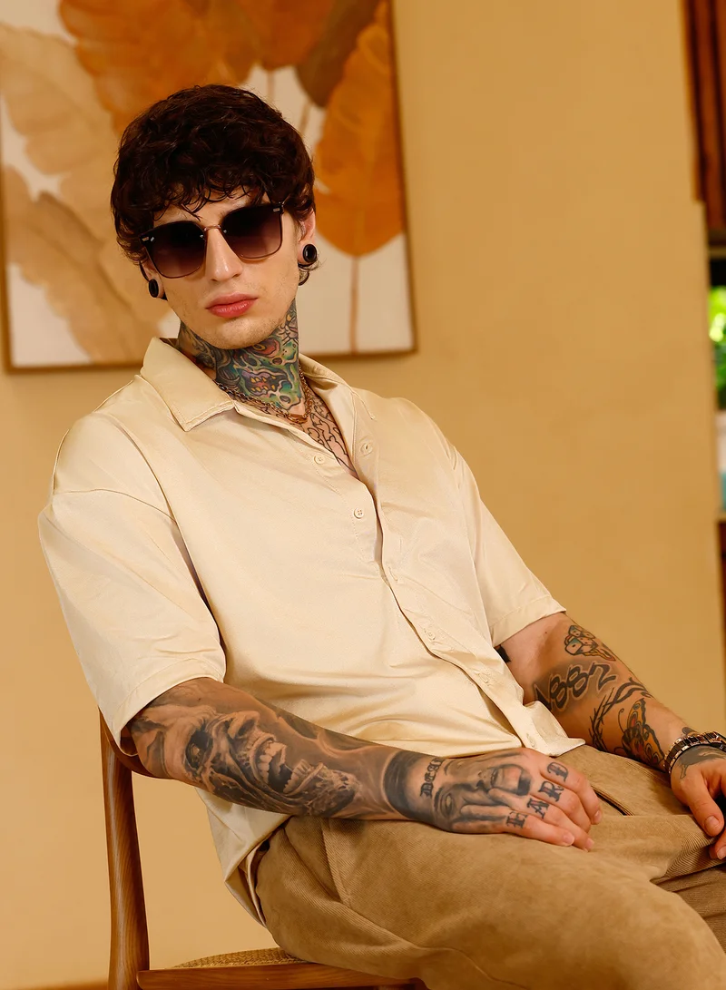 كامبوس سوترا Campus Sutra Men Satin Resort Oversized Shirt | Cuban Collar Short Regular Sleeves | Button Closure Straight Hem | Solid Plain | Woven Fabric For Casual & Daily Wear | Champayne Gold