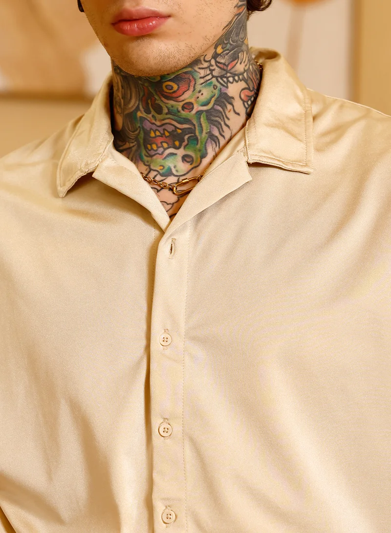 Campus Sutra Campus Sutra Men Satin Resort Oversized Shirt | Cuban Collar Short Regular Sleeves | Button Closure Straight Hem | Solid Plain | Woven Fabric For Casual & Daily Wear | Champayne Gold