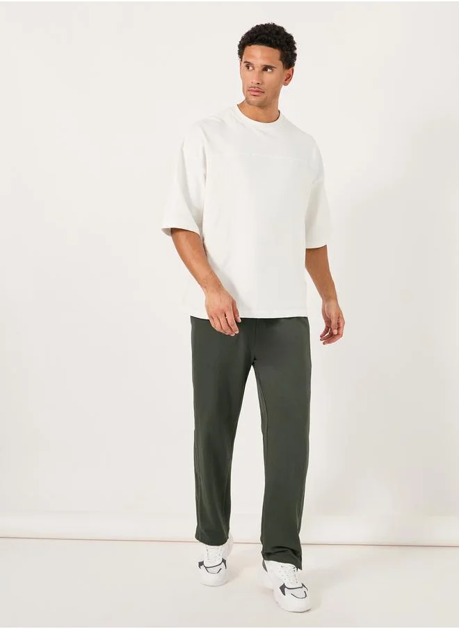 ستايلي Oversized Straight Leg Joggers with Popper Button