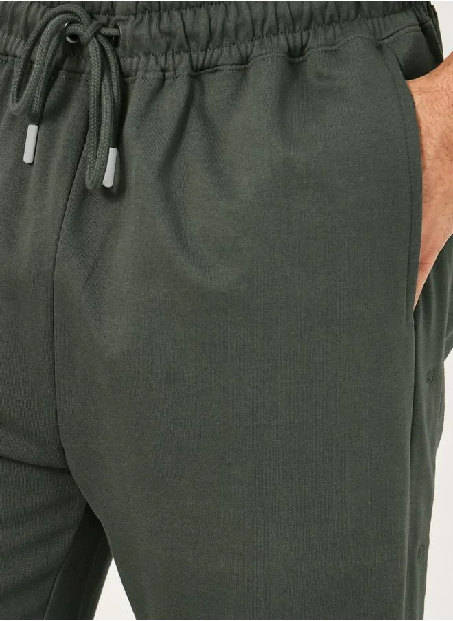 ستايلي Oversized Straight Leg Joggers with Popper Button