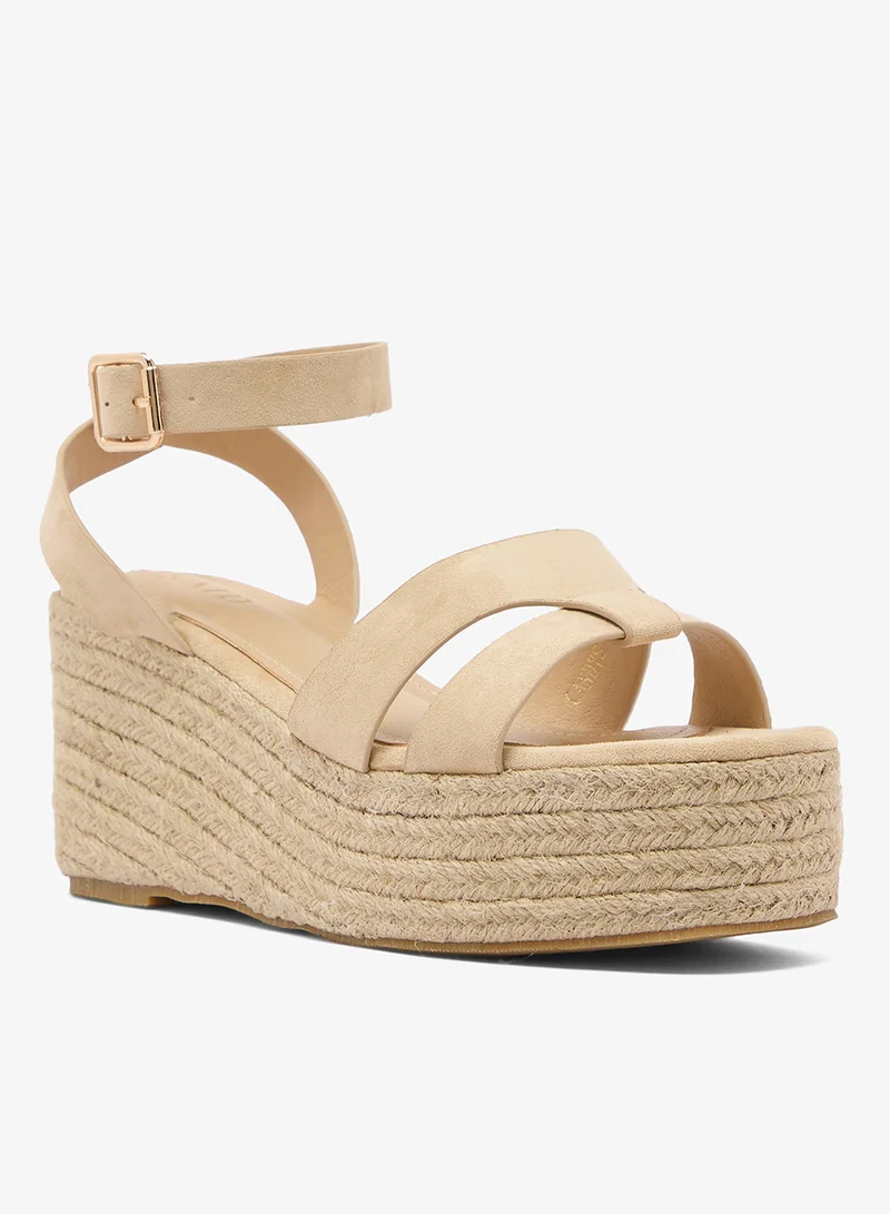 ريد صنادل بكعب وحزام للكاحل