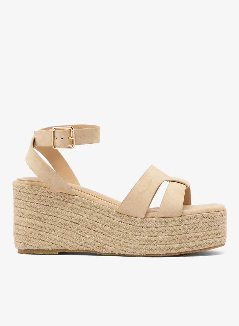 ريد صنادل بكعب وحزام للكاحل