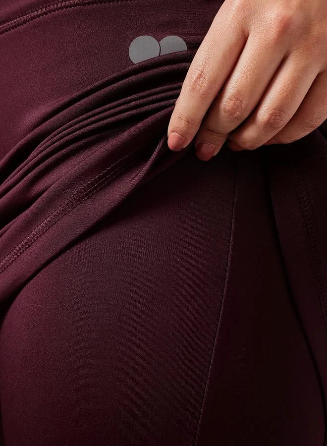 Clovia Maroon Maroon Snug Fit Active Skirt with Attached Tights for Women | Best Price UAE