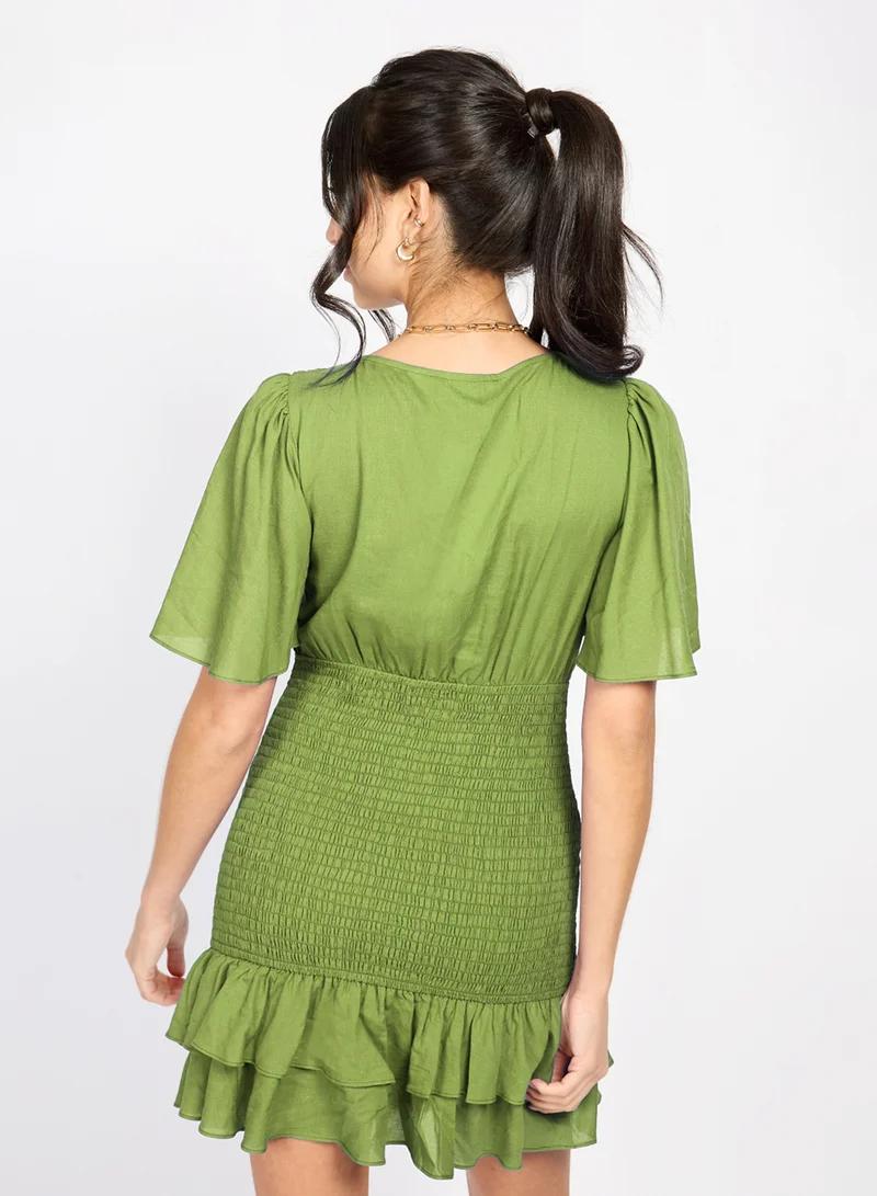 Little Mistress Olive Frill Mini Dress by Chloe Lewis