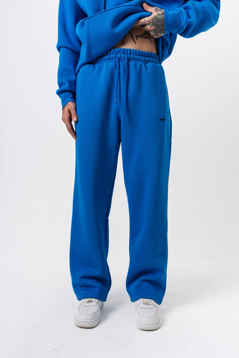 ريسباير بنطلون رياضي رجالي أزرق بقصة واسعة وتفاصيل حروف