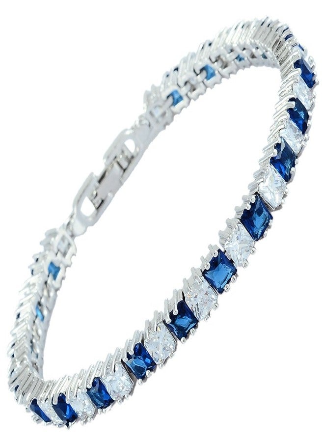 RIZILIA Ice Cube Princess Cut Simulated Blue Sapphire CZ 18K White Gold Plated Tennis Bracelet, 7" - Image 1