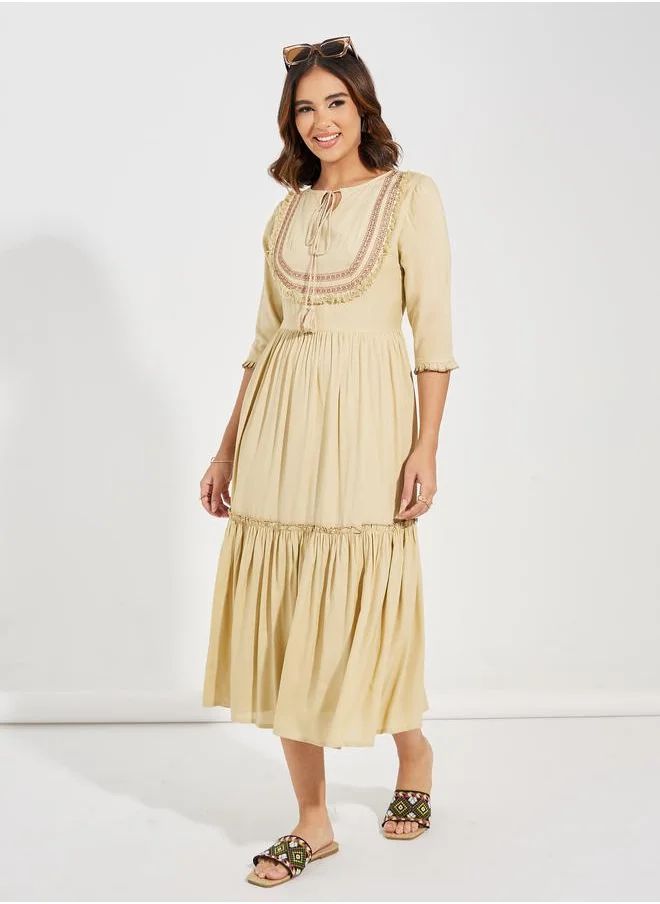 Styli Embroidered Panel Tie-Up Neck Midi Dress