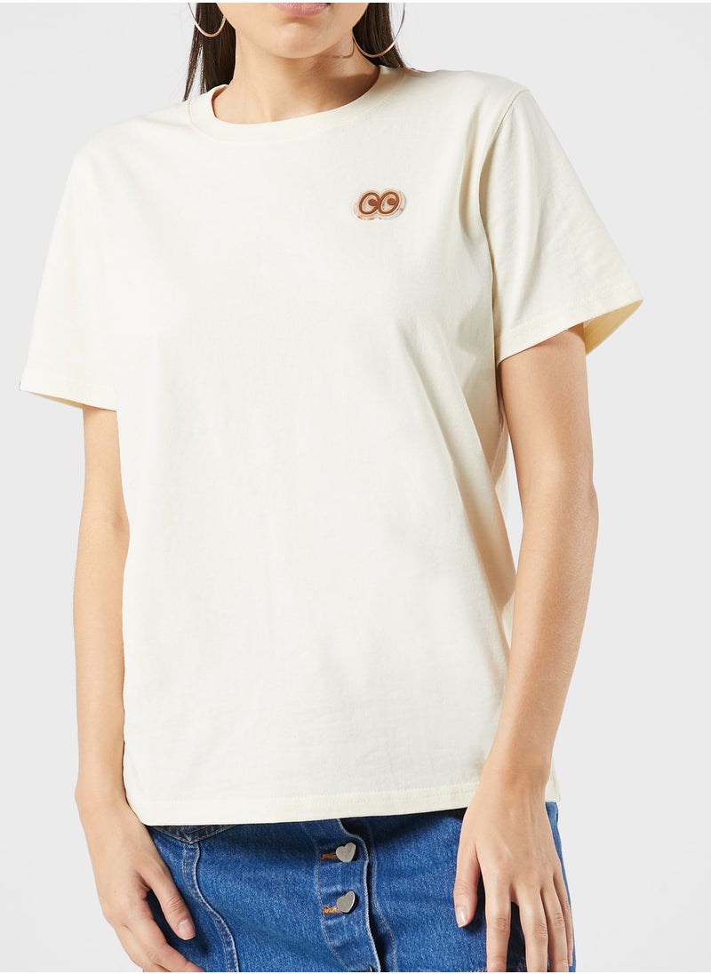 Mini Cream - Embro Badge T-Shirt - Image 1