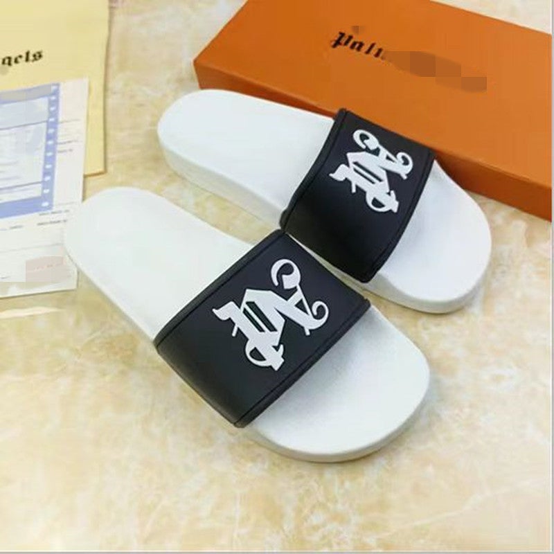 Cambodia Vietnam Nigeria high-end outdoor letter graffiti printed Palm Beach men and women angel flip-flops Black surface and white background 