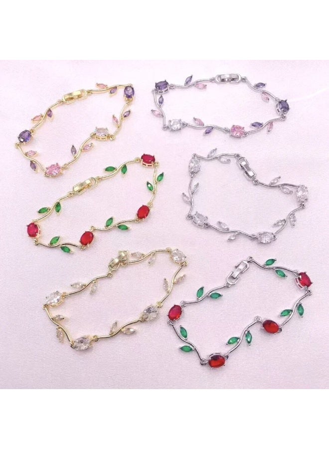 Elegant bracelet with red stones and green leaves in a luxurious design - available in silver - Image 1