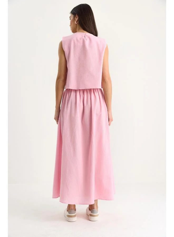 جينجر طقم بلوزة وتنورة بأزرار