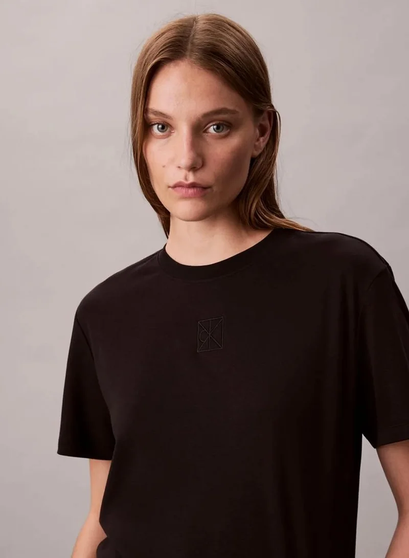 Calvin Klein black Supima Cotton Emblem Logo Graphic Classic T-Shirt for Women | Best Price UAE