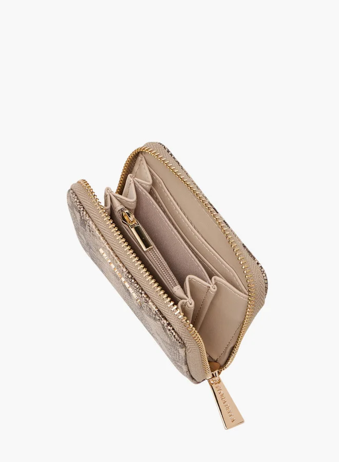 فلورا بيلا من شو إكسبرس محفظة بسحاب حولها بلون سادة