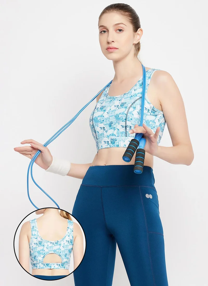 Clovia Clovia Medium Impact Padded Marble Print Sports Bra in Sky Blue