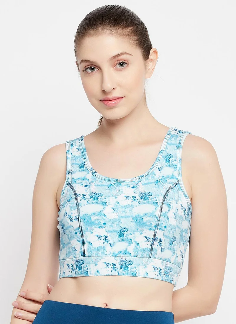 Clovia Clovia Medium Impact Padded Marble Print Sports Bra in Sky Blue