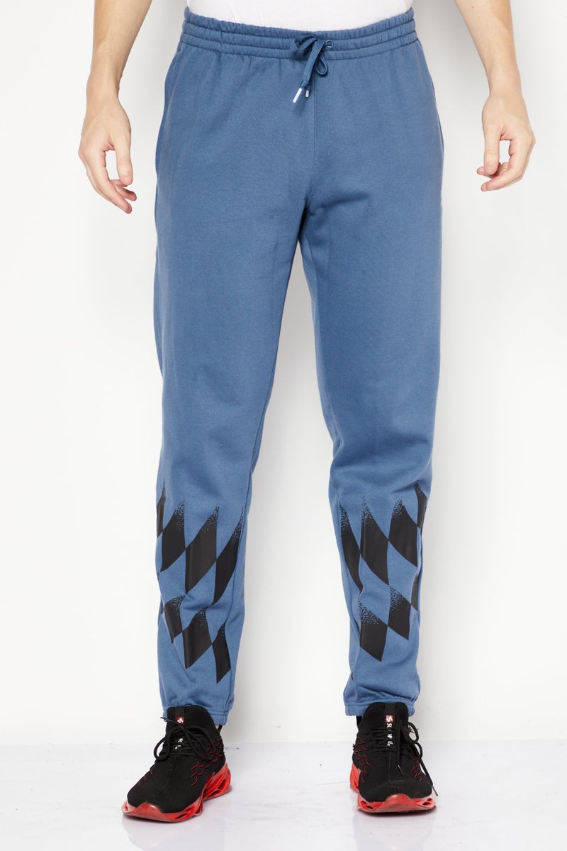 adidas Originals Men Sportswear Fit Running Sweatpants, Blue  - Image 1