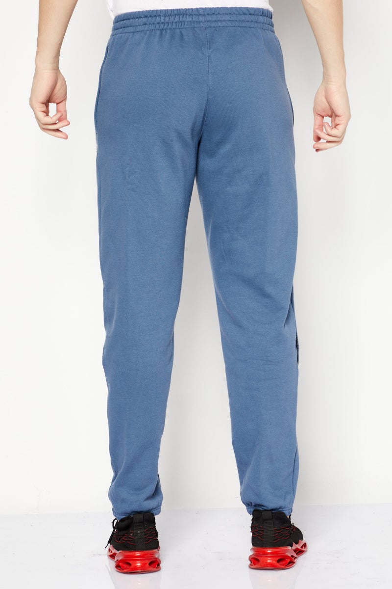 adidas Originals Men Sportswear Fit Running Sweatpants, Blue  - Image 2