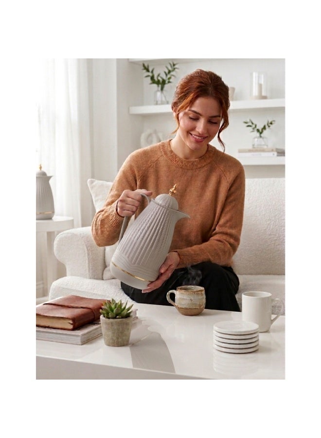 ميلريتش ترمس ميلريتش بريميوم 1.0 لتر - دلة عازلة للحرارة مع زجاج داخلي وردي - هيكل بلاستيكي أنيق للشاي والقهوة والمياه الساخنة - مقبض مقاوم للحرارة وقاعدة مانعة للانزلاق - Image 1