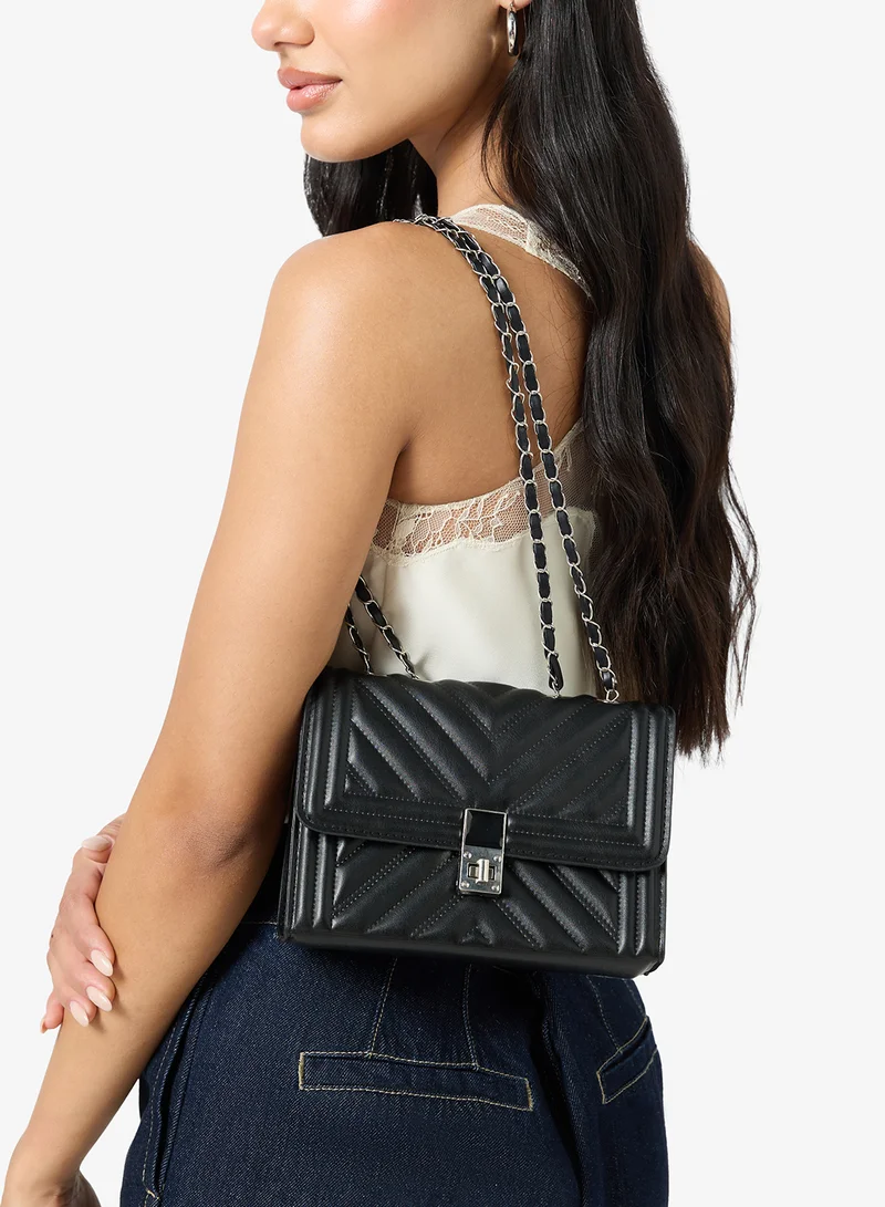 Black Quilted Crossbody With Silver Accent