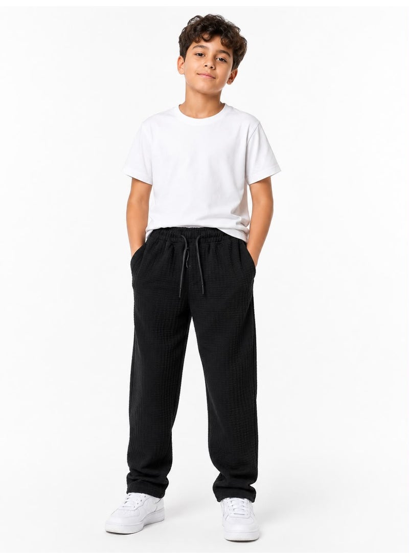 Caesar Boys' wide-leg trousers in Hashira fabric. - Image 1