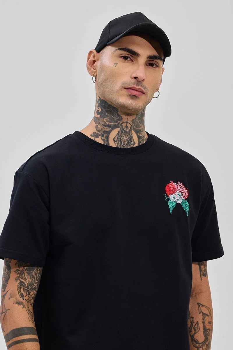 سنيتش تيشيرت أسود بطبعة جرافيك بقصة واسعة