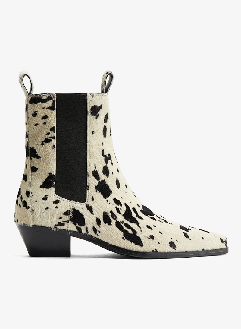 اتش اند ام بووت من الجلد