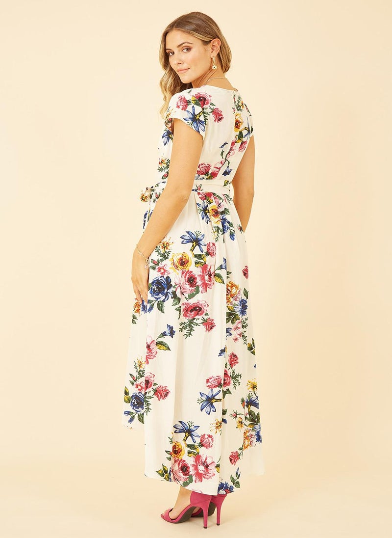 Yumi - Yumi Ivory Floral Wrap Dip Hem Dress - Image 1