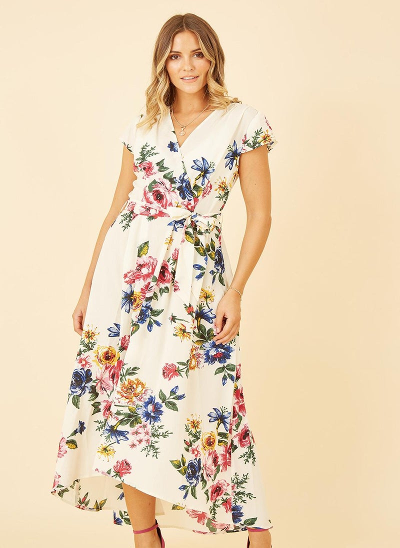 Yumi - Yumi Ivory Floral Wrap Dip Hem Dress - Image 1