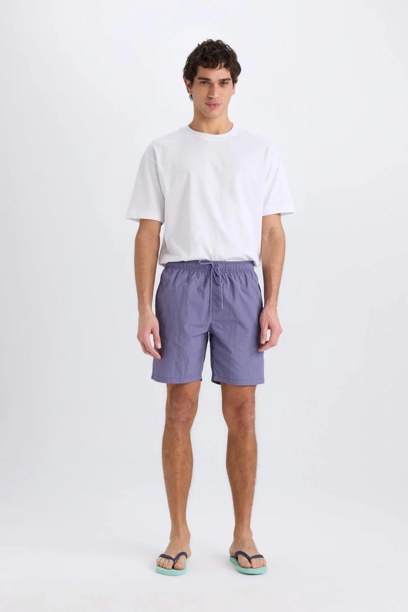 ديفاكتو Regular Fit Mesh Lined Swim Shorts