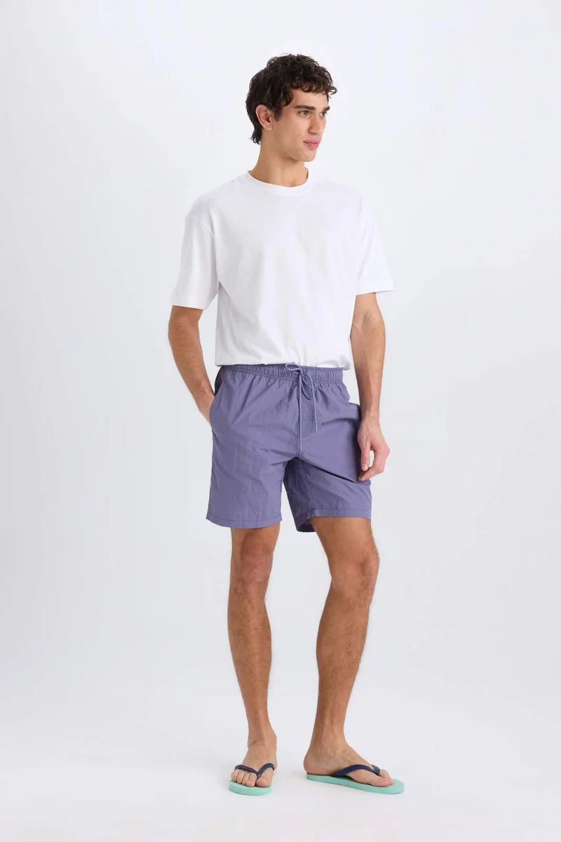 ديفاكتو Regular Fit Mesh Lined Swim Shorts