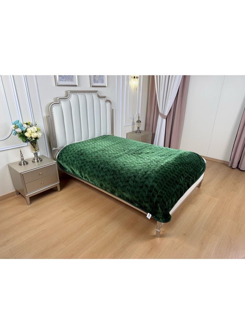 A heavy, velvety winter blanket for a double bed (4 kg), featuring a distinctive green color and elegant, raised classic patterns—created via laser etching—that offer a soft, smooth texture.