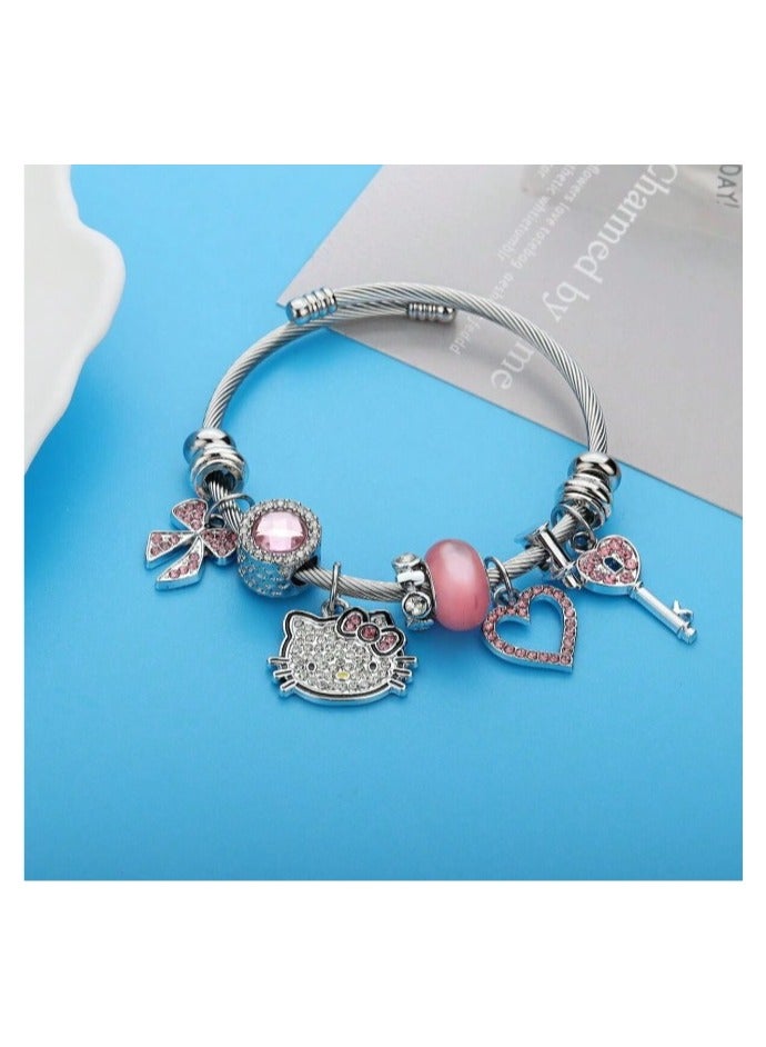 Hello Kitty Silver Stainless Steel Bracelet with Heart Charms, Ribbon Knot, Key, and Pink Stone Adjustable Size - Image 2