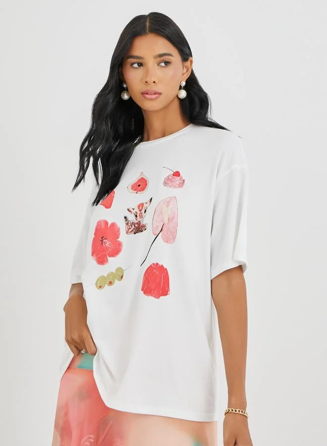 تايك تو تيشيرت كبير بطباعة جرافيك ورقبة دائرية