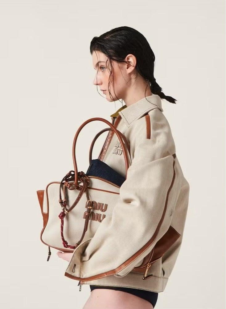 Miu Miu Miu Miu Canvas top-handle bag - Image 3