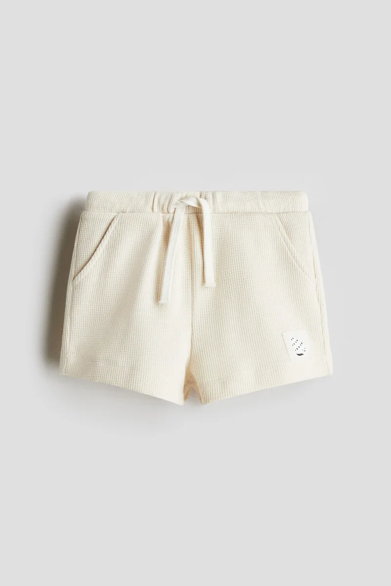 اتش اند ام Waffled cotton shorts