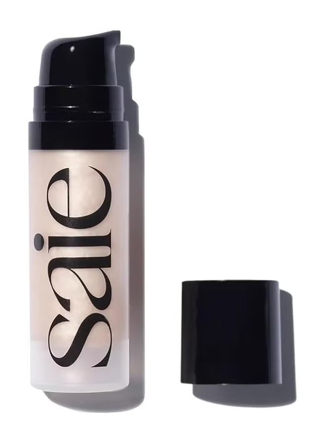 Saie Mini Glowy Super Gel Lightweight Illuminator 15ml - Luminizer + Makeup Primer for Glowing Skin - Enriched with Vitamin C + Hydrating Squalane Oil - Wear Alone or Under Makeup - StarglowMini Glowy Super Gel Lightweight Illuminator 15ml - Luminizer + Makeup Primer for Glowing Skin - Enriched with Vitamin C + Hydrating Squalane Oil - Wear Alone or Under Makeup - Starglow - Image 1