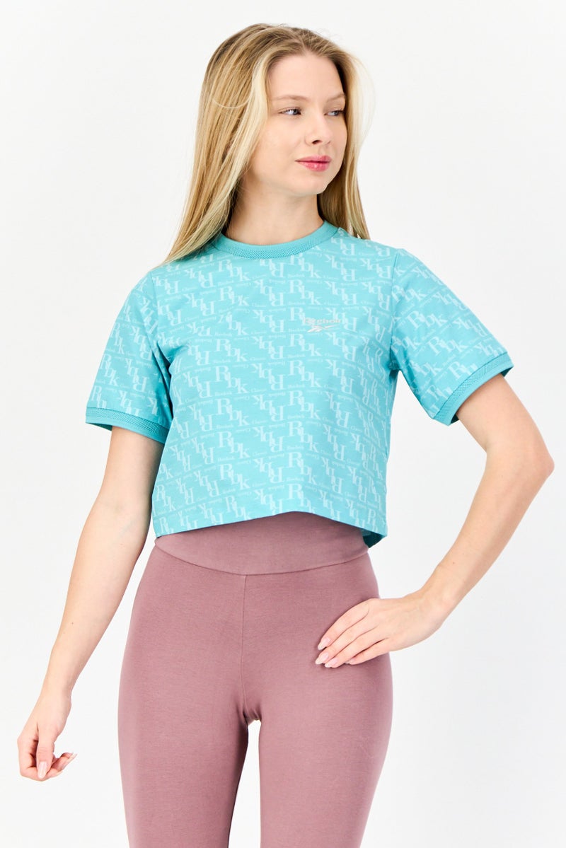 Reebok تي شيرت رياضي نسائي بأكمام قصيرة مناسب في الهواء الطلق، أخضر فاتح - Image 1