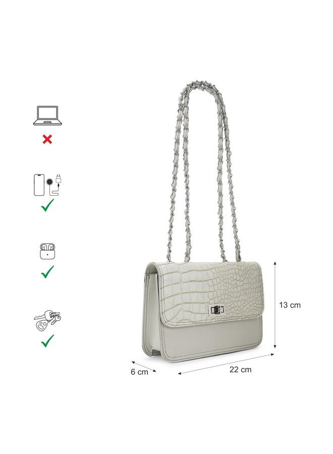 Fastrack Casual Sling Bag with Lock Closure for Girls, Medium Size with Internal Organiser and Metal Chain Strap, Made with High-Quality Faux Leather - Image 4