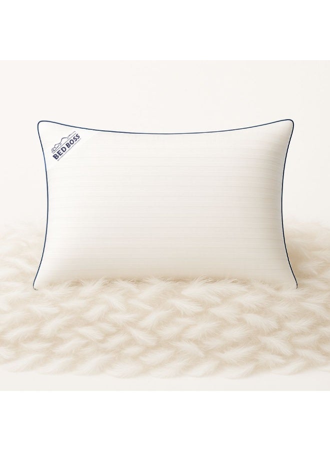 BED BOSS For a restful, comfortable sleep, this hotel pillow features the highest quality ostrich feather filling and is covered in 100% cotton for a restless night. Combining lightness and flexibility, it's the perfect choice for those seeking balanced support and superior comfort while sleeping. - Image 1